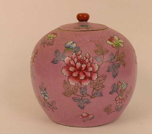 Early Quing Dynasty pink ground Famille Rose covered jar, 7 1/4 inches by 8 1/4 inches, est. $2,000-$3,000. Image courtesy Loew-Demers Auctions.