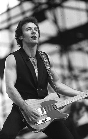 Well known for his New Jersey roots, Bruce Springsteen is pictured here in a 1988 concert in Germany. Photo by Thomas Uhlemann. Courtesy Deutsches Bundesarchiv (German Federal Archive).