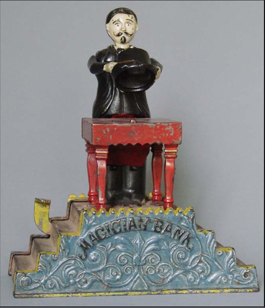 J. & E. Stevens Magician bank, circa 1901, est. $8,000-$12,000. RSL Auctions image.