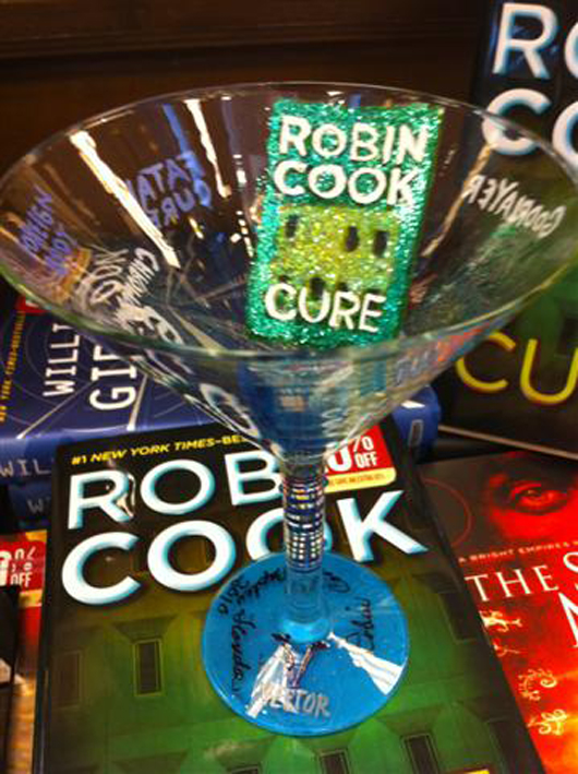 Martini glass designed for and signed by author Robin Cook. Auctions Neapolitan image.