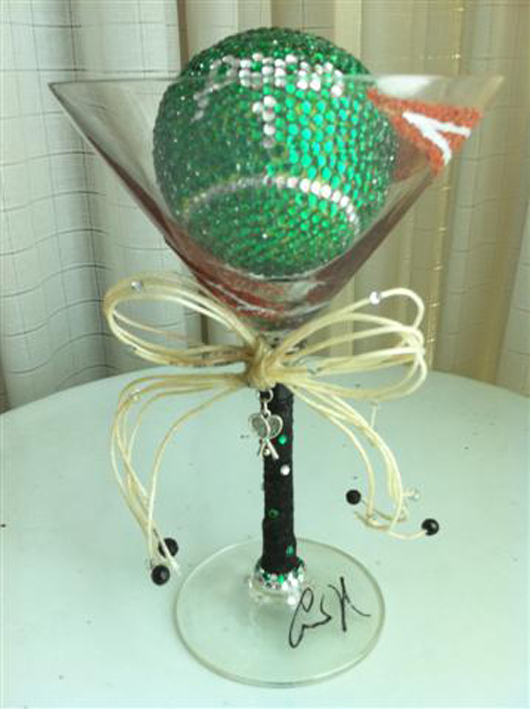 Martini glass designed for and signed by tennis star Anna Kournikova. Auctions Neapolitan image.