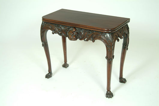 A fine Irish 18th-century carved mahogany card table that realized £26,000 ($41,580) at Hartleys in West Yorkshire.