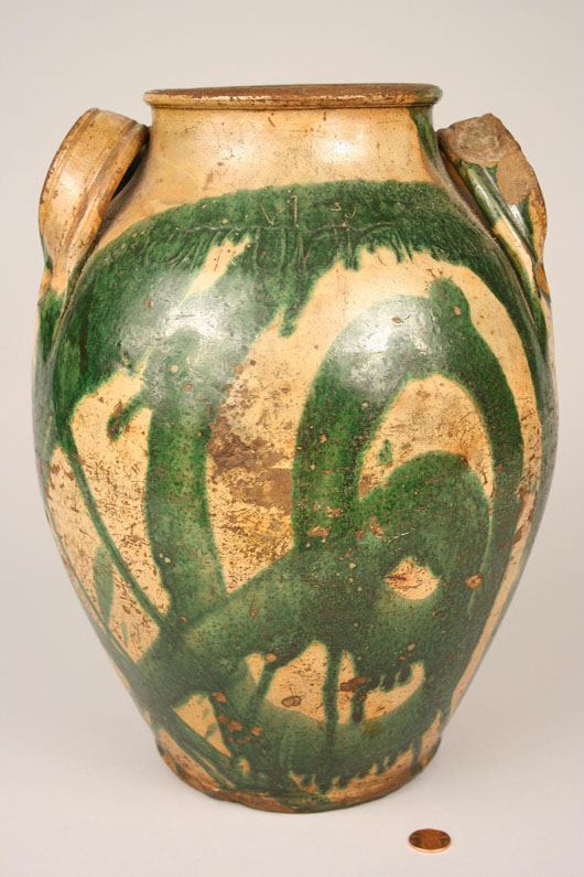 Decorated redware jar stamped ‘C.A. Haun,’ $36,800. Image courtesy Case Antiques Inc.