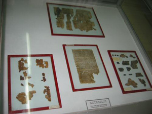 Fragments of the Dead Sea Scrolls on display at the Archeological Museum, Amman, Jordan. Image courtesy of Wikimedia Commons