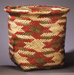 A vintage Choctaw basket is crafted with double wall construction and natural cane on a square-form base. Image courtesy of Neal Auction Co. and LiveAuctioneers archive.