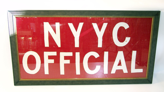 Framed flag from a New York Yacht Club committee boat, 24 inches x 48 inches. Estimate: $300-$400. Image courtesy Boston Harbor Auctions.