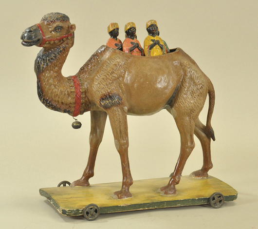 This skittles set consists of a camel on a wheeled platform, with Nubians skittle figures. It measures 15½ inches long by 14¾ inches tall and could bring $5,000-$7,000. Bertoia Auctions image.