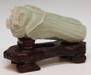 On Nov. 21, Austin Auction Gallery will offer the private collection of a retired U.S. Army colonel who began collecting Asian art while stationed in the Far East right after World War II. A premier piece from the collection is this late-19th-century (Qing/early Republic) Chinese translucent pale celadon jade carving of two crickets atop a cabbage. It measures 6 1/2 inches long and weighs 3.25 lbs. Image courtesy of Austin Auction Gallery.