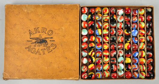 Akro Agate No. 1 boxed set of assorted corkscrew marbles. Marbles in condition 9.4 out of 10. Estimate $4,000-$6,000. Morphy Auctions image.