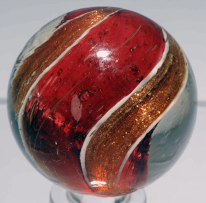 Large cranberry Lutz marble, 1-13/32 inches in diameter, condition 9, rarely found in this size. Estimate $3,000-$4,000. Morphy Auctions image.