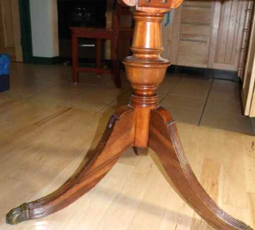 The color variations in this "walnut" table pedestal indicate that it is actually made of red gum that was originally stained to look like walnut. Fred Taylor photo.