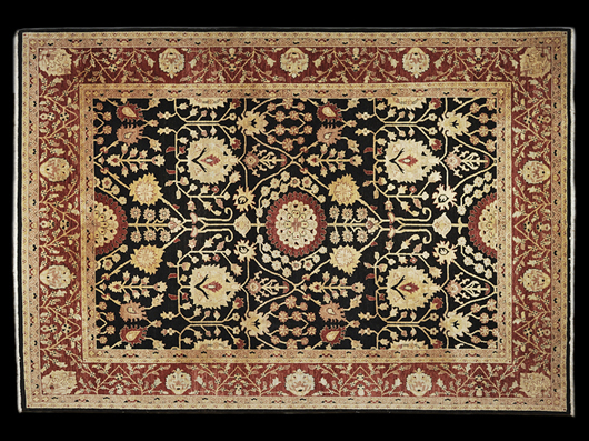 Pakistan Oushak carpet, whole pile on cotton 13 feet 10 inches x 9 feet 11 inches. Estimate: $800-$1,200. Image courtesy of Morton Kuehnert Auctioneers & Appraisers.