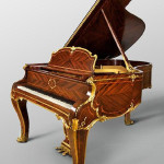 Rare Steinway & Sons grand piano in Louis XV case, circa 1901, stamped ‘G. Zimm,’ special rosewood veneered parquetry case with giltwood moldings and gilt bronze feet, est. $25,000-$35,000. Image courtesy of Millea Bros.