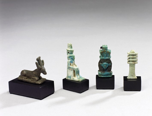 A selection of Egyptian amulets and figurines on sale with London antiquities dealers Charles Ede Ltd., priced at (from left): 550 pounds ($885), 190 pounds ($305), 250 pounds ($400), 90 pounds ($145). Image courtesy Charles Ede Ltd.