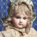 Jumeau Portrait Bebe of superb quality with "Au Papa Entrennes" shop label, 19 inches, pressed bisque socket head, almond-shape blue eyes. Estimate $7,000-$12,000. Image courtesy of Frasher's Doll Auction.