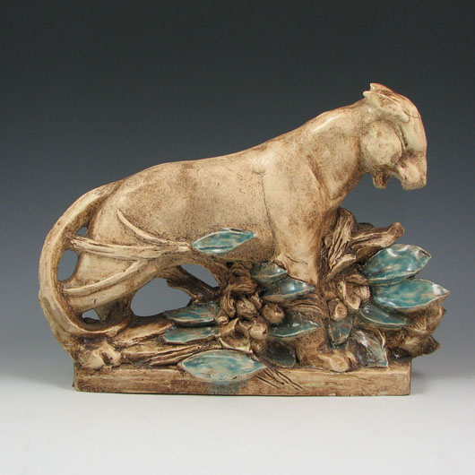 The one-of-a-kind Panther handmade by longtime McCoy designer Sidney Cope sold for $14,950. Although the Panther never went into production, the price is considered ar record for a piece of McCoy pottery. Image courtesy Belhorn Auction Services.