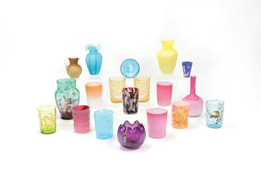 Group of satin overlay includes quilted vase and glasses, together with colored hobnail glass, ruby spatter glass, enameled vases, etc., approximately 19 pieces. Estimate: $150-$200. Image courtesy of Pook & Pook Inc.