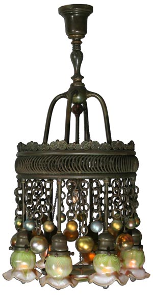 From a private collection in Philadelphia, this Tiffany Favrile glass and bonze Moorish chandelier is 34 inches high. It carries a $30,000-$50,000 estimate. Image courtesy of Fuller’s Fine Art Auctions.