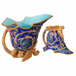 This majolica helmet pitcher made by Wedgwood in 1872 holds a surprise. Just flip the picture so the top is at the bottom and you will see a Roman helmet. The topsy-turvy sold for $4,800 at Brunk Auctions of Asheville, N.C.
