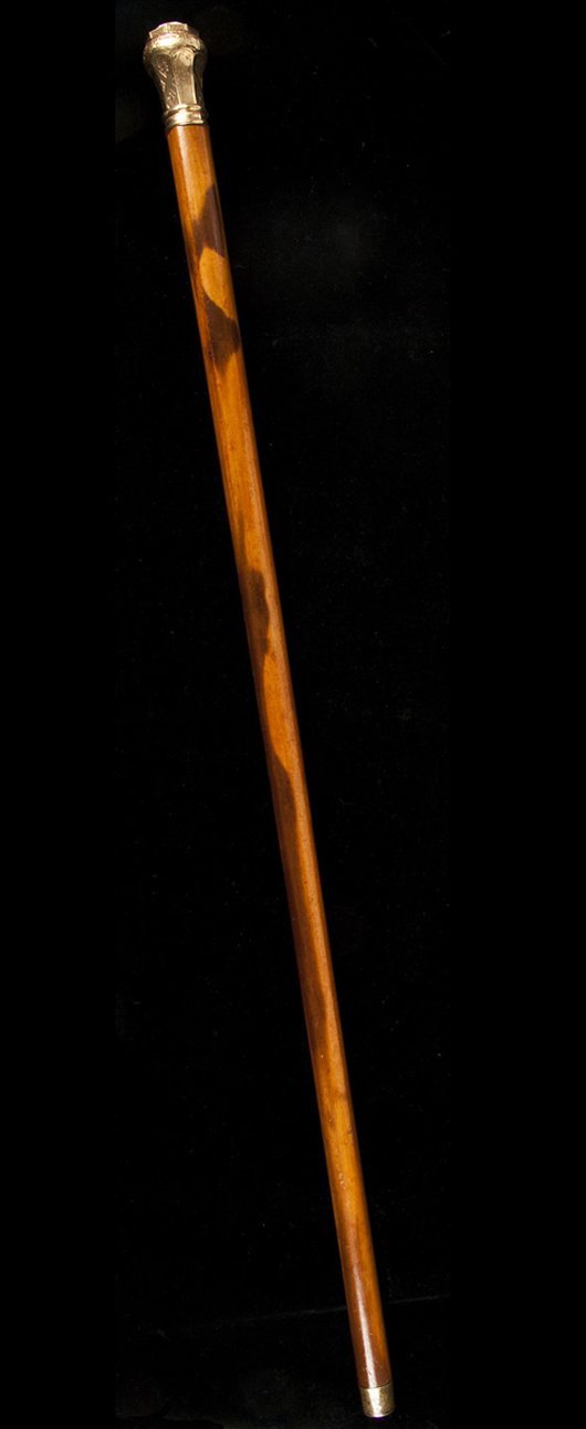 Rare California walking stick with a gold knob and an original piece of gold in quartz mounted on top. Sold $21,600. Image courtesy of PBA Galleries.