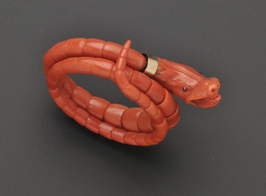 Antique coral serpent bracelet, ruby eyes and articulated body. Interior circumference 5 1/2 inches. Estimate: $1,000-$1,500. Image courtesy of Skinner Inc.
