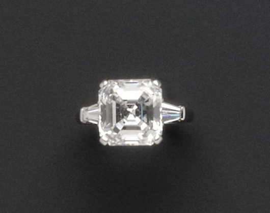 Platinum and diamond solitaire, Graff, prong-set with a square emerald-cut diamond weighing 5.55 carats, flanked by tapered baguette diamonds, size 4 1/4, signed. Estimate: $175,000-$225,000. Image courtesy of Skinner Inc.