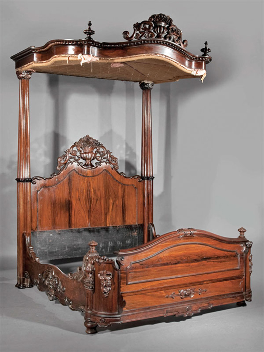 This important American Rococo carved rosewood half tester bed made $42,700. Image courtesy of Neal Auction Co.