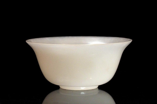 Chinese white jadeite center bowl, 5 1/2 inches high x 11 3/4 inches high. Estimate: $800-$1,000. Image courtesy of Artingstall & Hind.