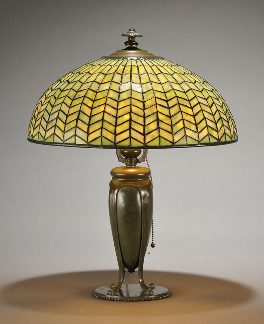 Tiffany Studios table lamp, mosaic art glass and bronze, early 20th century, marked Tiffany Studios, New York. Estimate $6,000-$8,000. Image courtesy Skinner Inc.