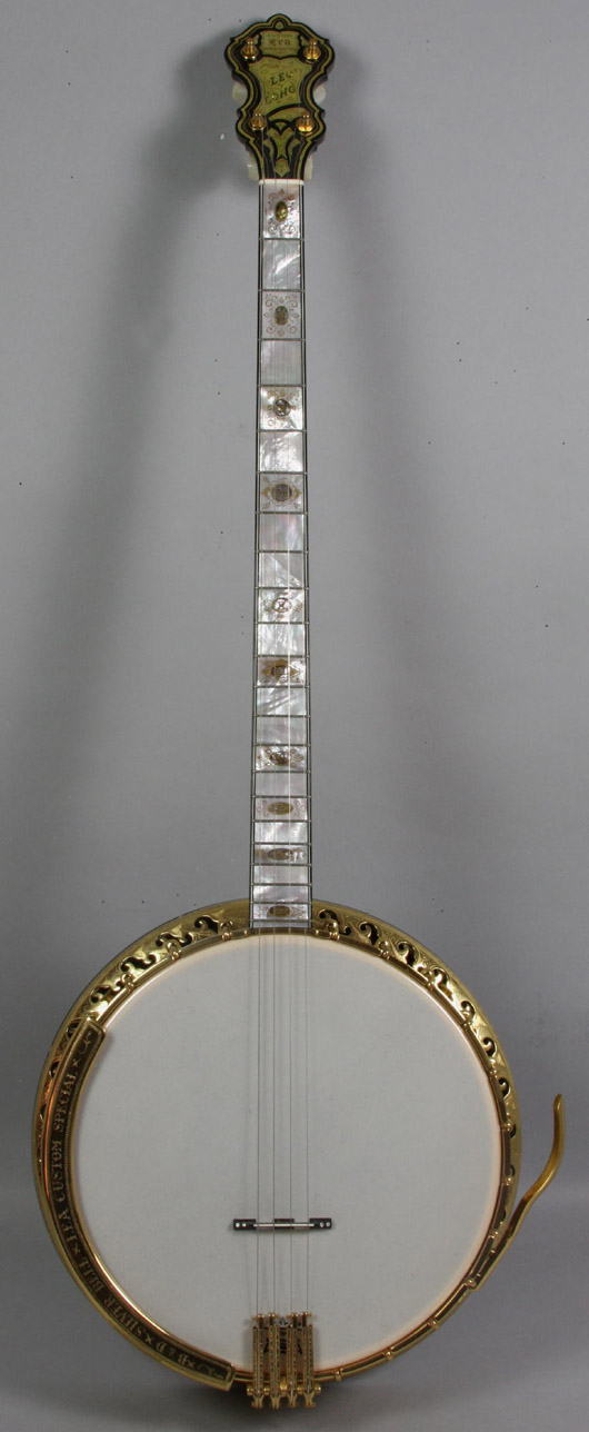 Rare custom banjo, Silver Bell series by Bacon & Day. Abalone inlay and gold-plated accents. Comes with custom case. Estimate $15,000-$25,000. Image courtesy of Kaminski Auctions.