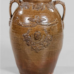 This rare John Lehman stoneware political jar featured the head of Jefferson with ‘Hurrah for Jefferson’ on one side with George Washington and ‘Hurrah for Washington’ verso. In fine condition, the 20 3/4-inch jar may have been made in either Alabama or Georgia. The Birmingham Museum of Art purchased it for $74,750. Image courtesy of Brunk Auctions.
