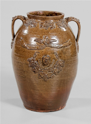 This rare John Lehman stoneware political jar featured the head of Jefferson with ‘Hurrah for Jefferson’ on one side with George Washington and ‘Hurrah for Washington’ verso. In fine condition, the 20 3/4-inch jar may have been made in either Alabama or Georgia. The Birmingham Museum of Art purchased it for $74,750. Image courtesy of Brunk Auctions.
