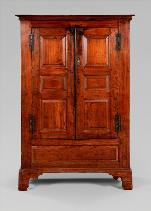 A paneled Chippendale sideboard from Eastern Shore Virginia, nearly identical to this one, sold at Sotheby’s. Wrought iron H-hinges are original and its backboards were undisturbed. It sold for $13,800 (est. $12,000-$18,000). Image courtesy of Brunk Auctions.