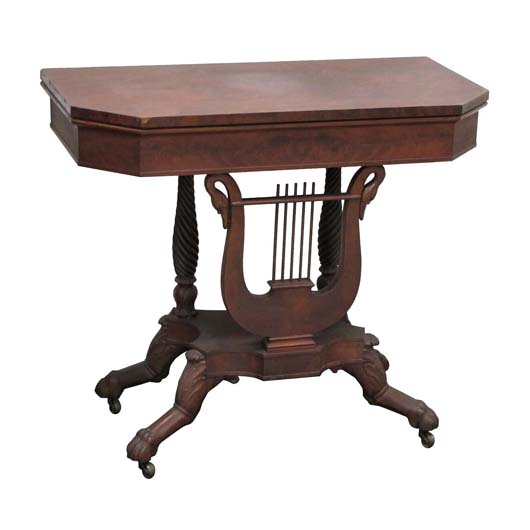 Fine Federal carved mahogany lyre base game table with swan head terminals, Philadelphia, circa 1820. Image courtesy of William Jenack Estate Appraisers and Auctioneers.