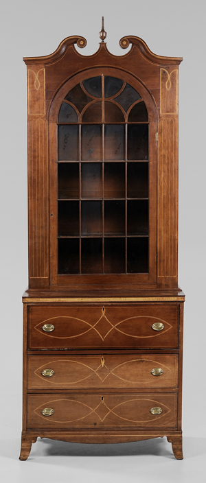 The ‘fluted pilaster group’ of which this North Carolina secretary bookcase is a fine example is discussed and illustrated in a 1981 issue of ‘Early Southern Decorative Arts.’ Image courtesy of Brunk Auctions.