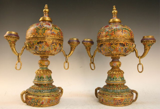 Pair of cloisonné covered censers, enamel and brass, China, Qing Dynasty (1644-1911), Qianlong mark on bottom, one of two, about 19 inches high. Estimate: $35,000-$40,000. Image courtesy of Auctions by Showplace Antique & Design Center.