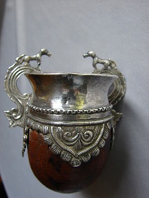 Spanish colonial stirrup cup, silver over incised gourd. Image courtesy of West Palm Beach Antiques Festival.