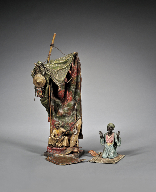 Bergman cold-painted bronze figure, Austria, early 20th century, depicting a man kneeling on a prayer rug, stamped bag mark, 5 inches high. Estimate $1,000-$1,500. Image courtesy of Skinner Inc.