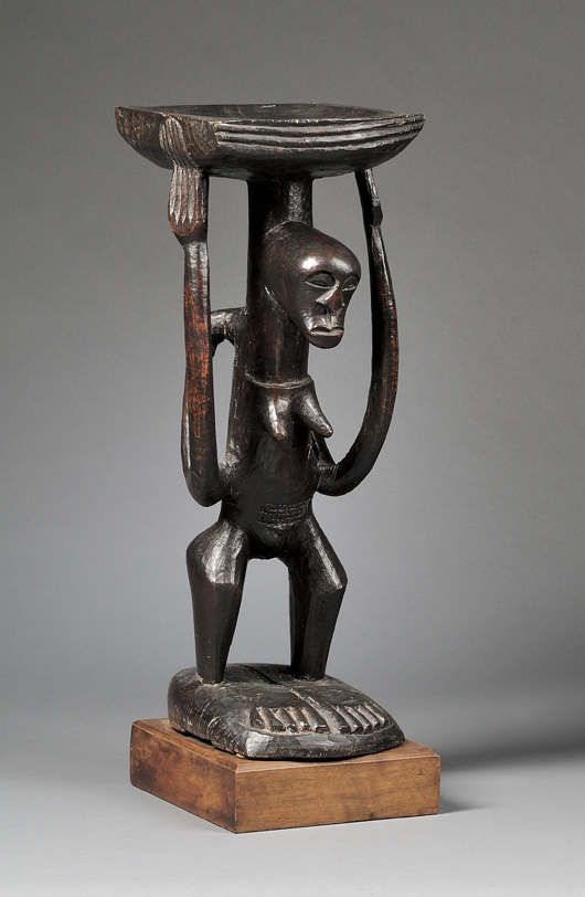 Rare African carved wood stool, Songe. Estimate $10,000-$15,000. Image courtesy of Skinner Inc.
