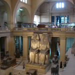 The statue of Amenhotep III and Queen Tiye is displayed in the main hall of the Egyptian Museum in Cairo. Image by Kristofert, courtesy of Wikimedia Commons.