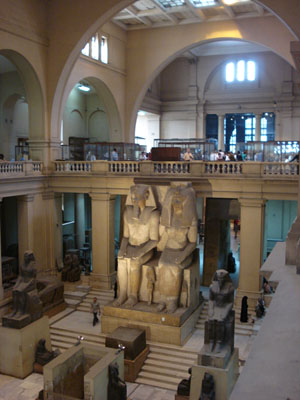 The statue of Amenhotep III and Queen Tiye is displayed in the main hall of the Egyptian Museum in Cairo. Image by Kristofert, courtesy of Wikimedia Commons.