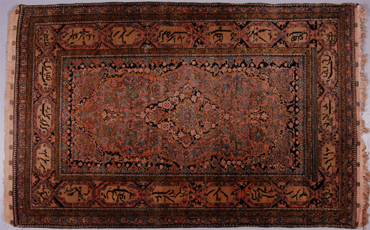 Kashan inscription rug, one of more than 25 Oriental and Persian estate rugs to be auctioned. Myers Auction Gallery image.