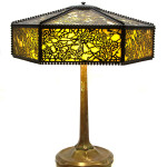 Tiffany Studios paneled Favrile glass and bronze table lamp, Grapevine pattern, the hexagonal shade stamped Tiffany Studios New York, the base stamped Tiffany Studios New York 531, width of shade 16 inches, height overall 21 inches, estimate: $15,000-$20,000. Image courtesy of Leslie Hindman Auctioneers.