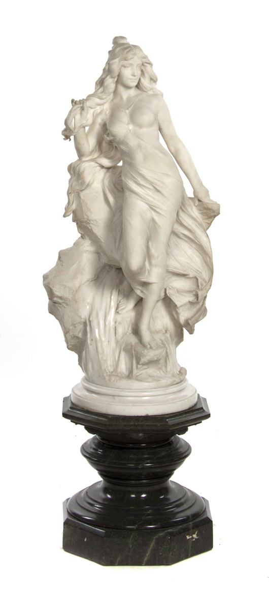 Italian marble sculpture, Raffaelo Romanelli (1856-1928), in the Art Nouveau style, signed ‘Proff R. Romanelli Larcdessi Firenza,’ set on an octagonal black marble base, height of sculpture 37 1/2 inches, estimate: $20,000-$40,000. Image courtesy of Leslie Hindman Auctioneers.