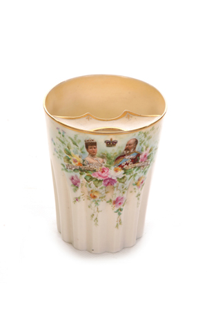 King Edward VII moustache mug, manufactured in 1901 by Belleek China, Northern Ireland, to commemorate the Coronation of King Edward VII and Queen Alexandra. Image courtesy of Church's China.