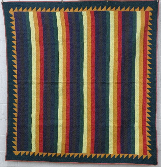 Joseph's Coat quilt, circa 1900, Lancaster County, Pa., inner sawtooth border, plain pieced cotton front, printed cotton back, 78 inches x 76 inches. Estimate: $1,500-$1,700. Image courtesy of T. Glenn Horst & Son Inc.