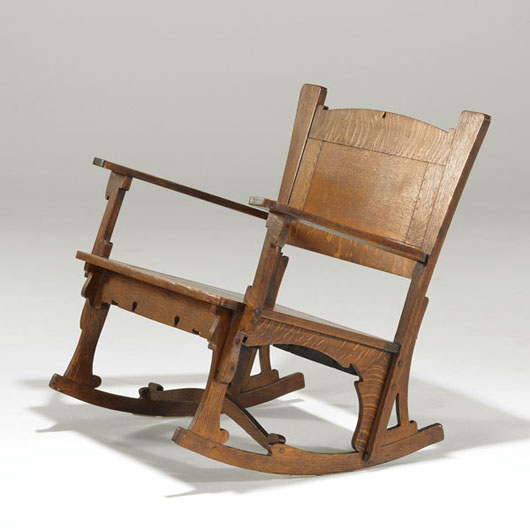 Charles Rohlfs rocking chair, 1902, estimate: $8,000-$12,000. Image courtesy Rago Arts and Auction Center.