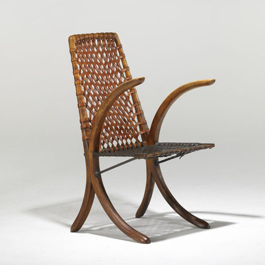 Wharton Esherick armchair, aak, leather and wrought iron, estimate: $25,000-35,000. Image courtesy Rago Arts and Auction Center.