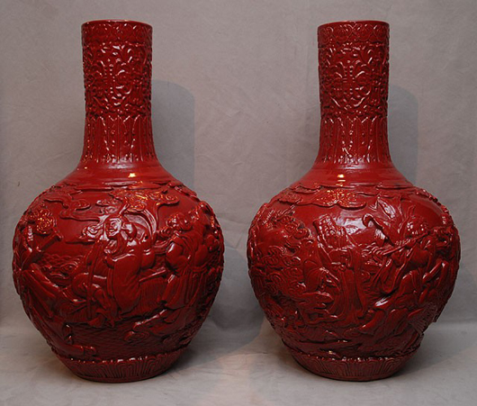 Standing 24 inches high, this rare pair of old Chinese red glazed vases/jardinières has a $1,000-$1,500 estimate. Image courtesy of Bill Hood & Sons.