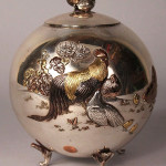 This rooster-decorated Japanese silver tea caddy soared to $32,220. Image courtesy Case Antiques.